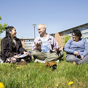Picture of three students talking