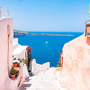 White Greek houses and a clear blue sky and sea