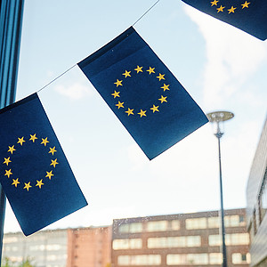 Picture of a window and flags of the European Union